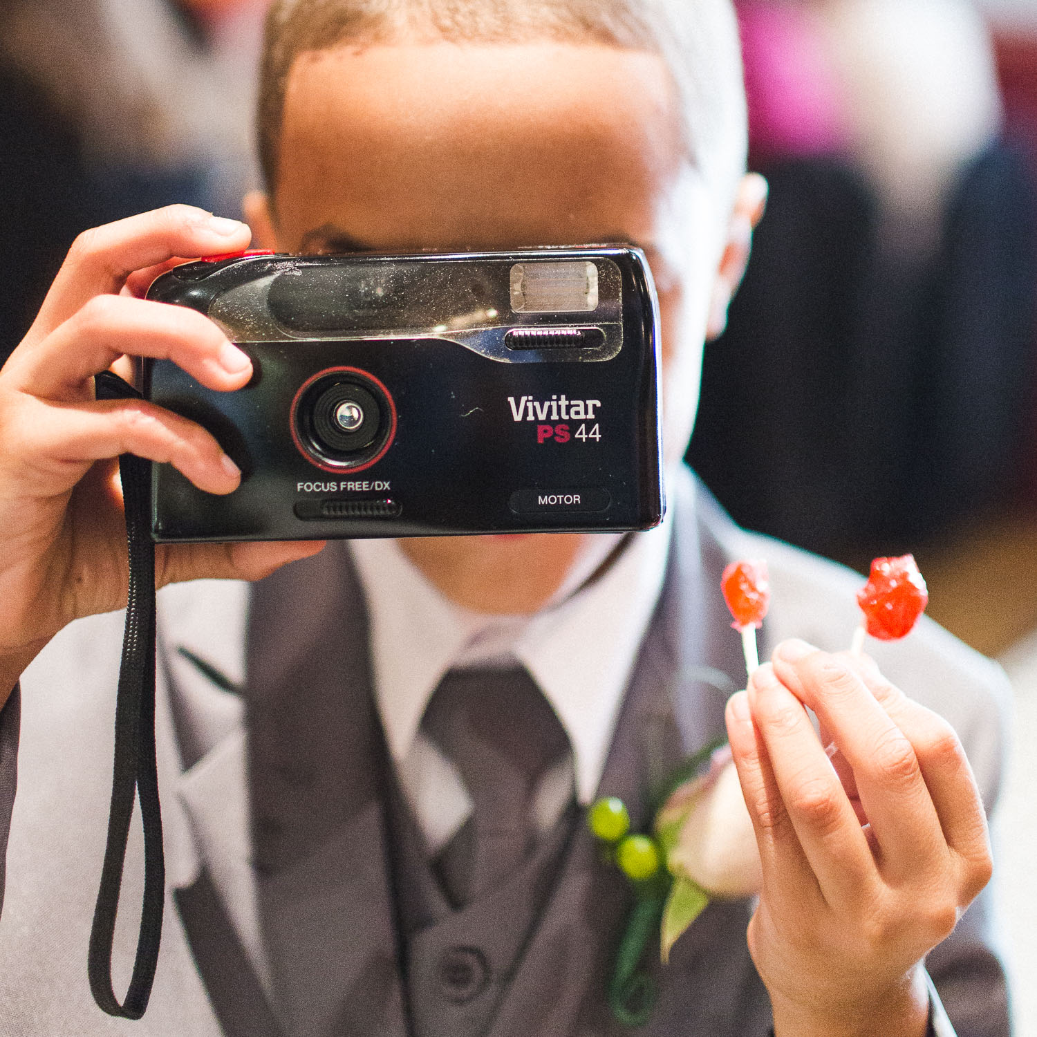 Why you don't need a wedding photographer reason 33 1/3: You can Instagram the kid with an 80s era film point-and-shoot and score a zillion likes.