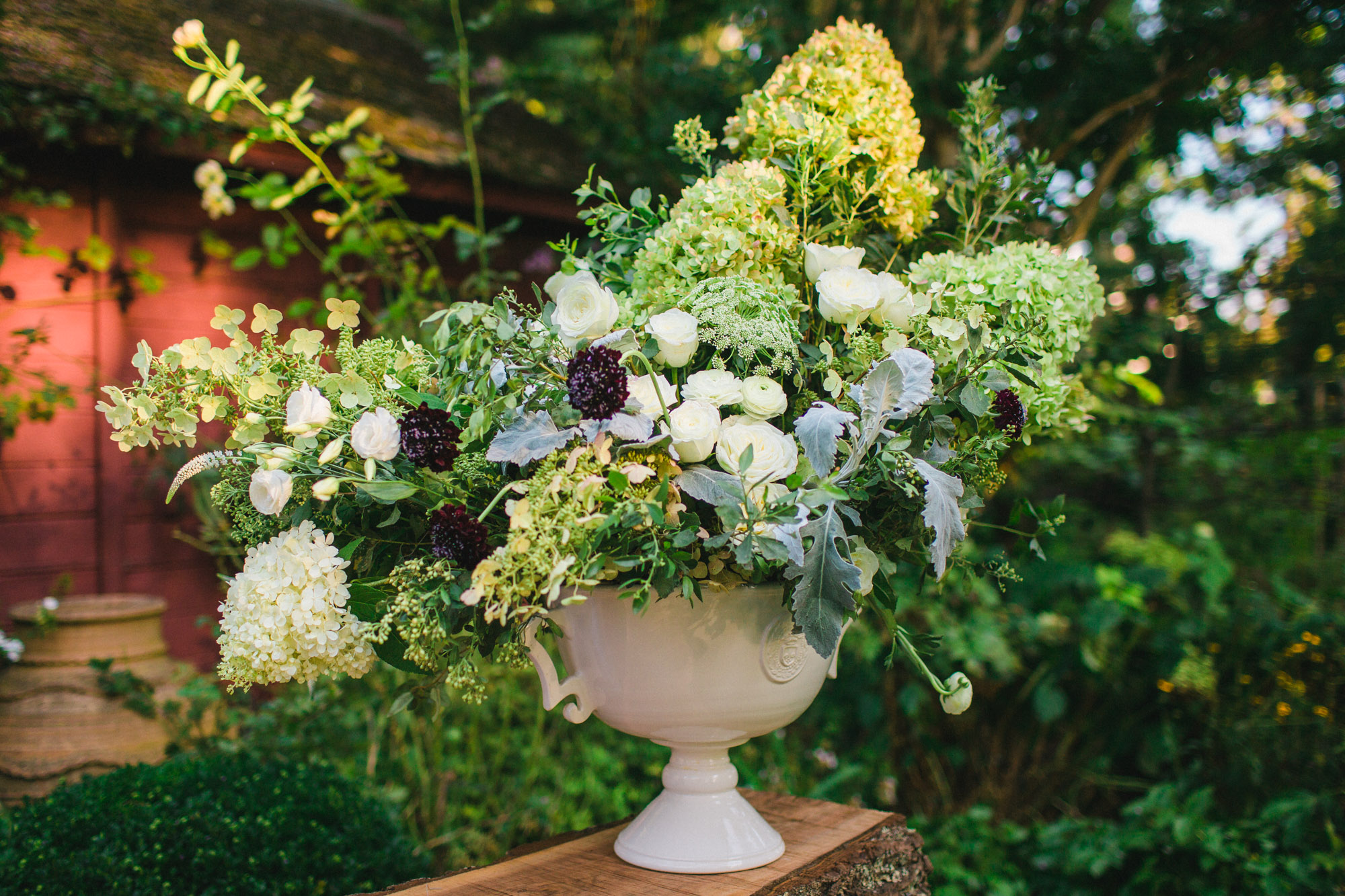 You might want to hire a professional wedding photographer reason 38: Artful photo of a floral arrangement.