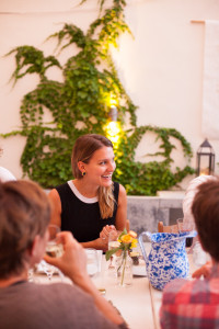 smiling woman at a wedding at the maas building