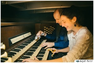 wedding portrait bride and groom at a piano with dragon toys