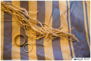 pair of wedding rings on an heirloom tallis