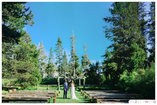 Standing among the pines in a Weddding Dress at the hideout at kirkwood wedding venue