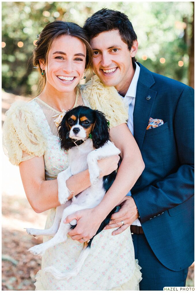 Wedding couple posing with small dog, bay area wedding