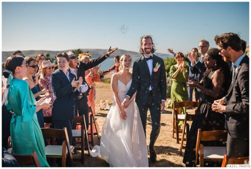 bride and groom during recessional marconi lodge wedding