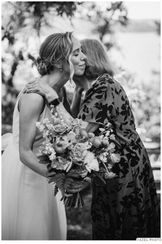 bride and her mother hug