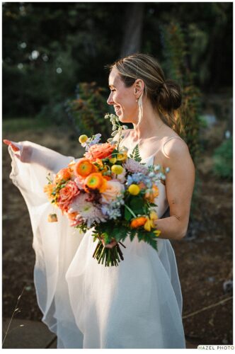 bride at golden hour with bouquet