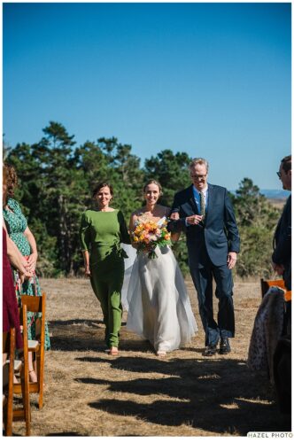 bride with parents during processional