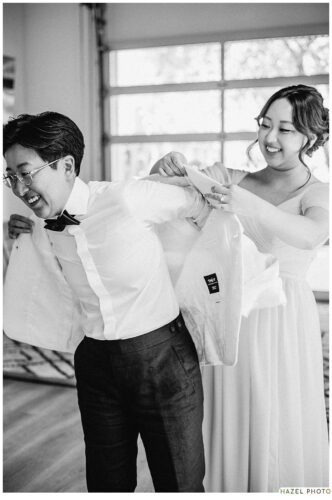 partner putting on jacket