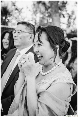 family member laughing during the ceremony