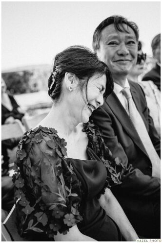 family member laughing during the ceremony