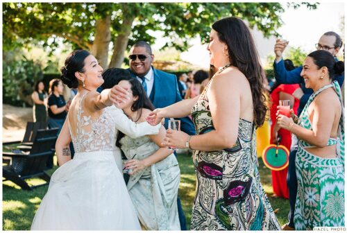 newlywed greeting guests after the ceremony