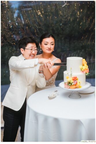 newlyweds cutting the wedding cake