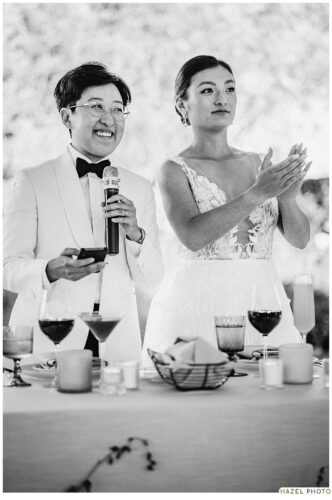 newlyweds giving a toast